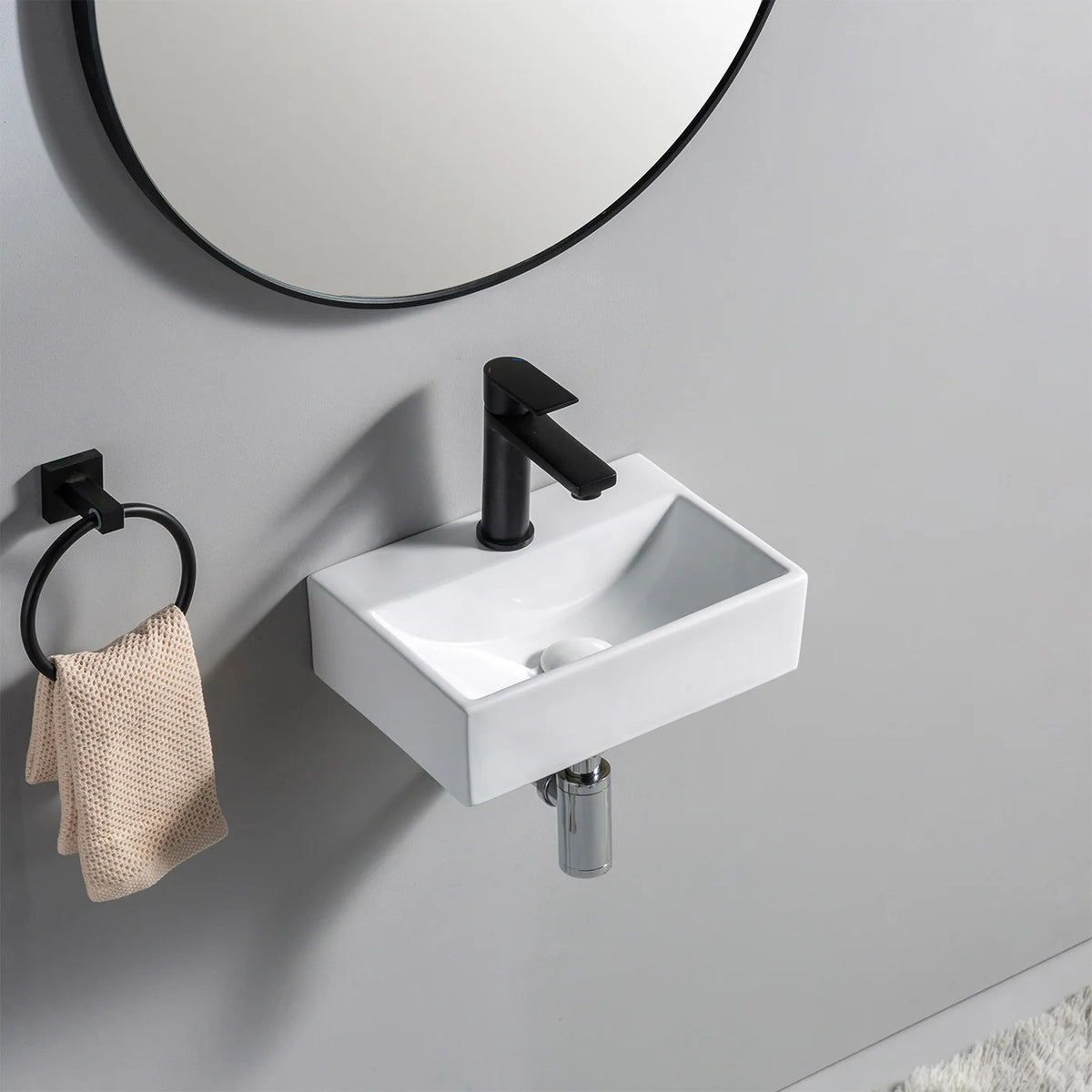 Lavabo Paris K300 blanco con grifo negro en la pared